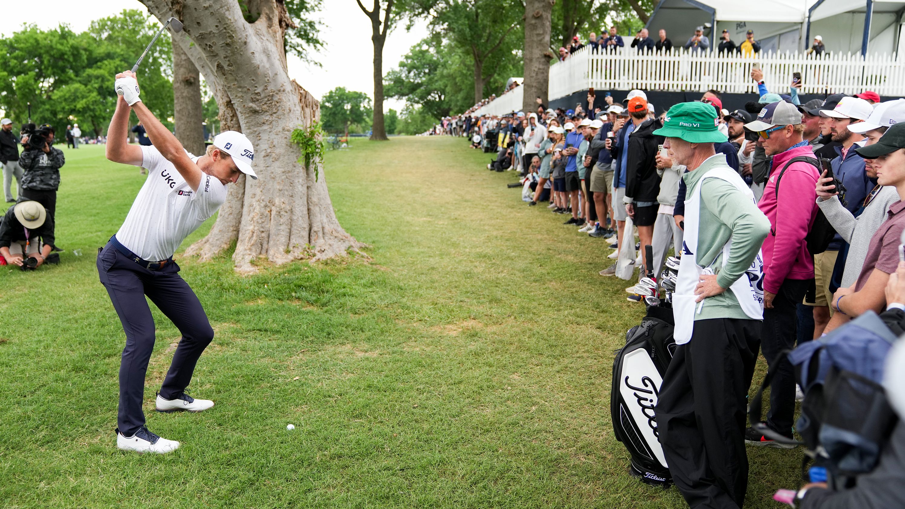 Spectators watch Will Zalatoris hit his shot on the 16th hole during the third round.