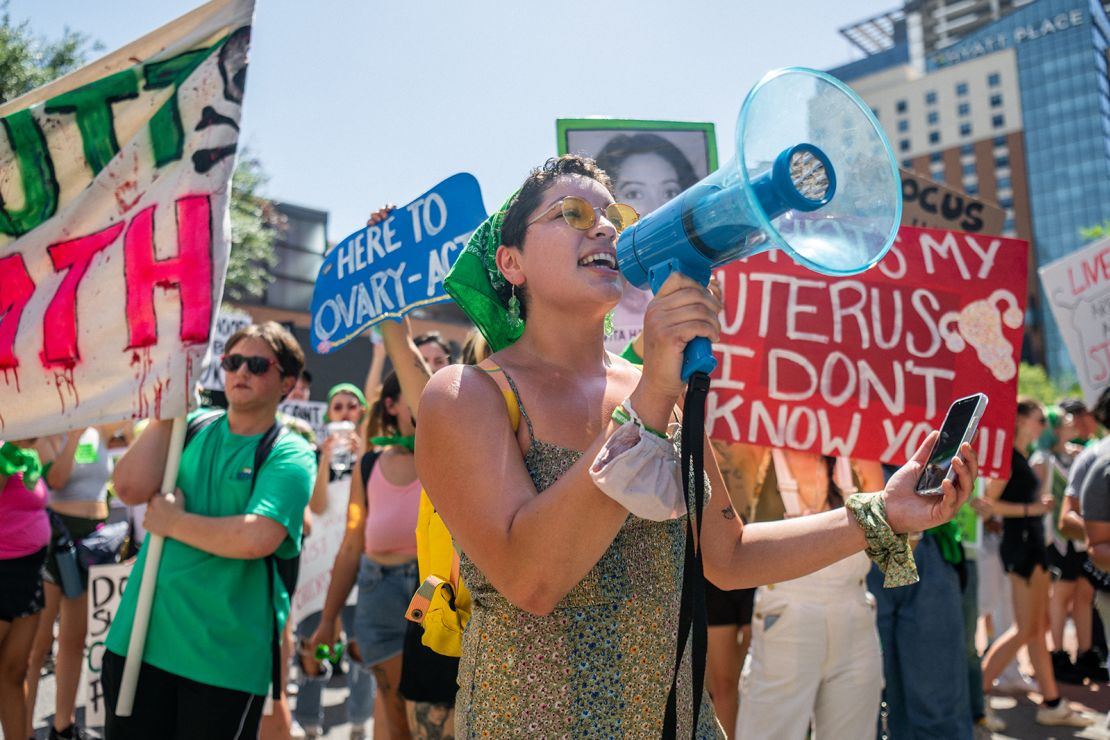 Abortion rights activists and supporters march outside of the Austin Convention Center where the American Freedom Tour with former President Donald Trump was held on May 14, 2022 in Austin, Texas.