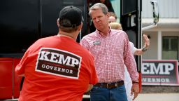 Georgia Gov. Brian Kemp greets people as he campaigns during a Get Out the Vote cookout at the Hadden Estate at DGD Farms on May 21, 2022 in Watkinsville, Georgia. 