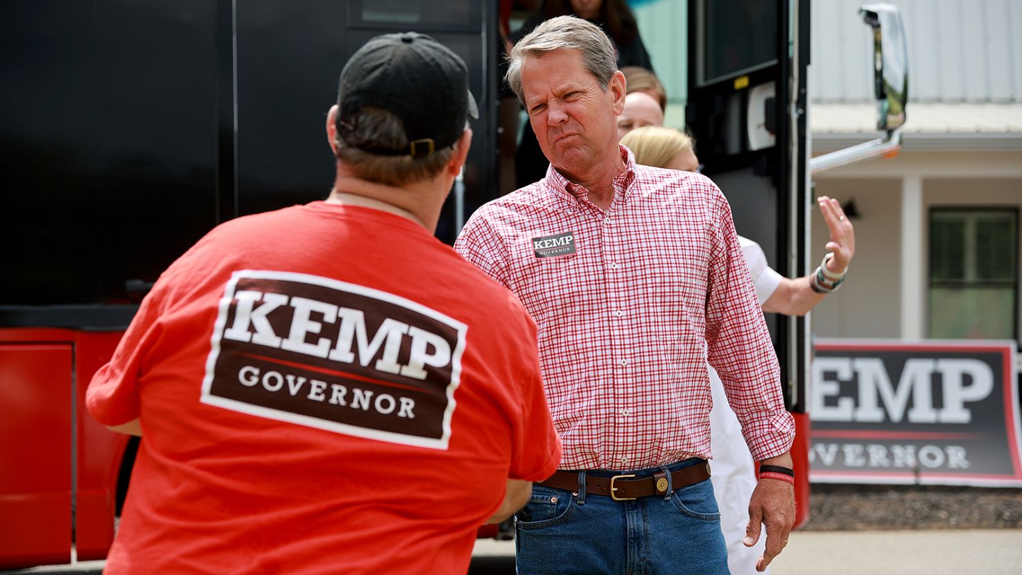 Republican Gov. Brian Kemp greets people as he campaigns in Watkinsville, Georgia, on May 21, 2022. 