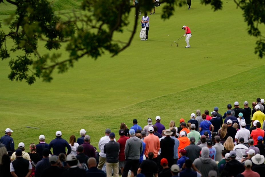 Abraham Ancer hits from the fairway on the fourth hole.