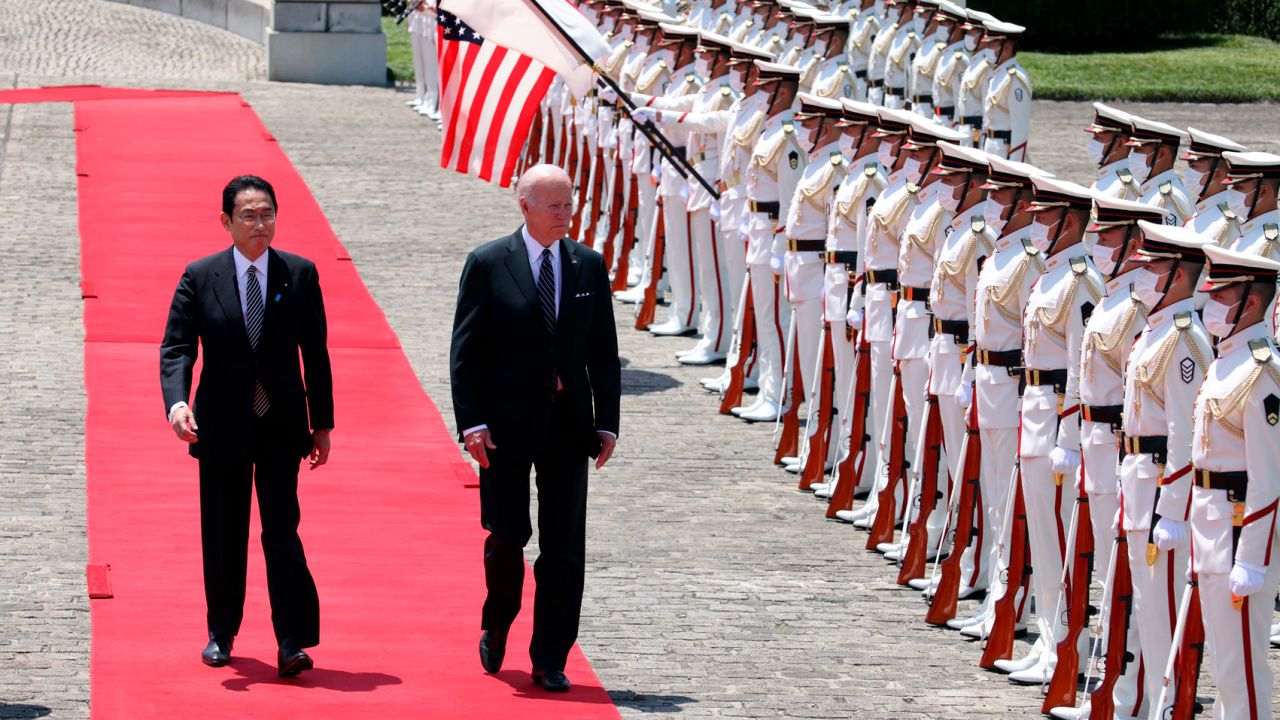 President Joe Biden receives a salute from a guard of honor with Japan's Prime Minister Fumio Kishida ahead of their meeting in Tokyo on May 23, 2022.