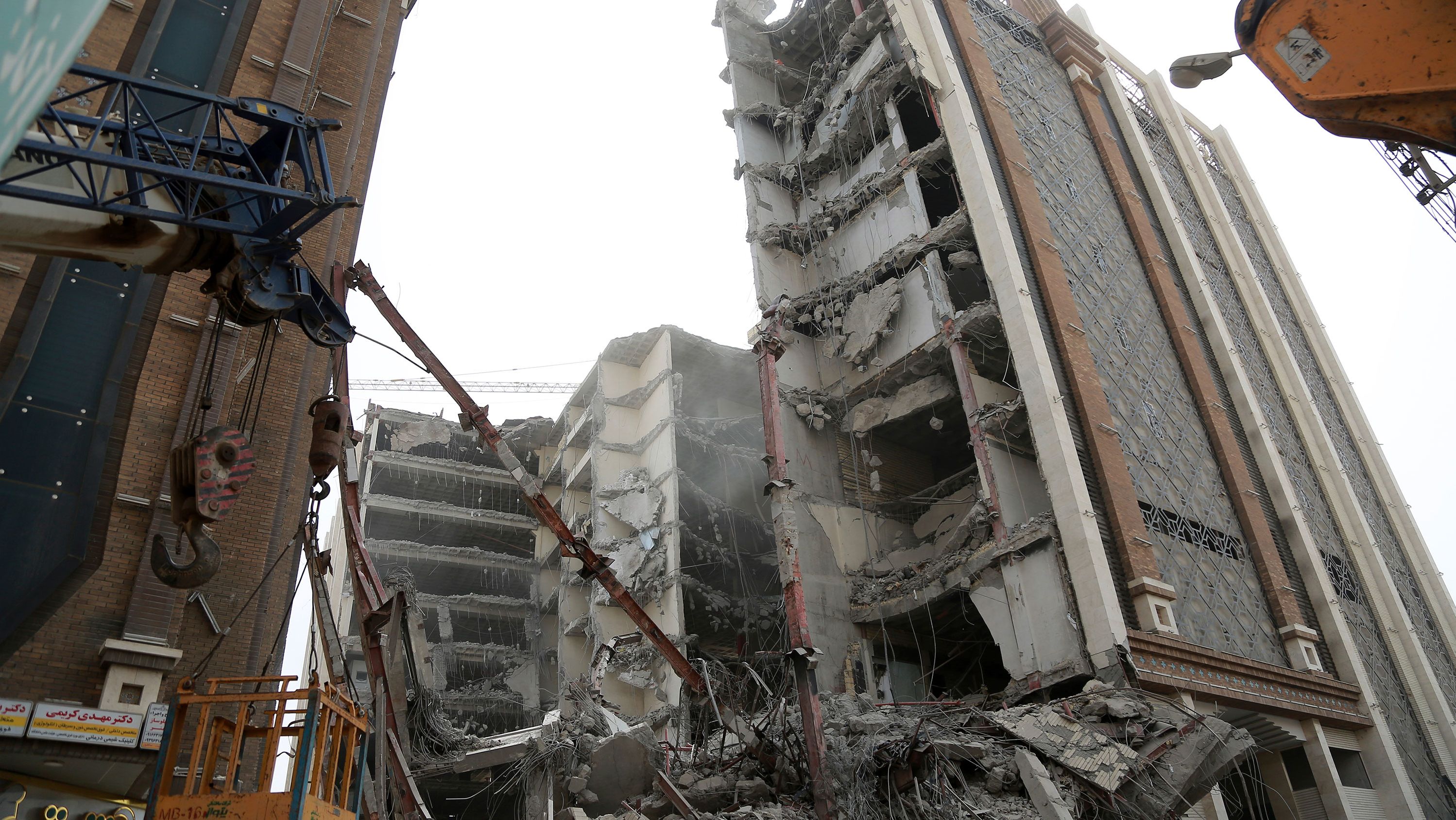 Death toll rises to 24 in Iran building collapse, as search efforts