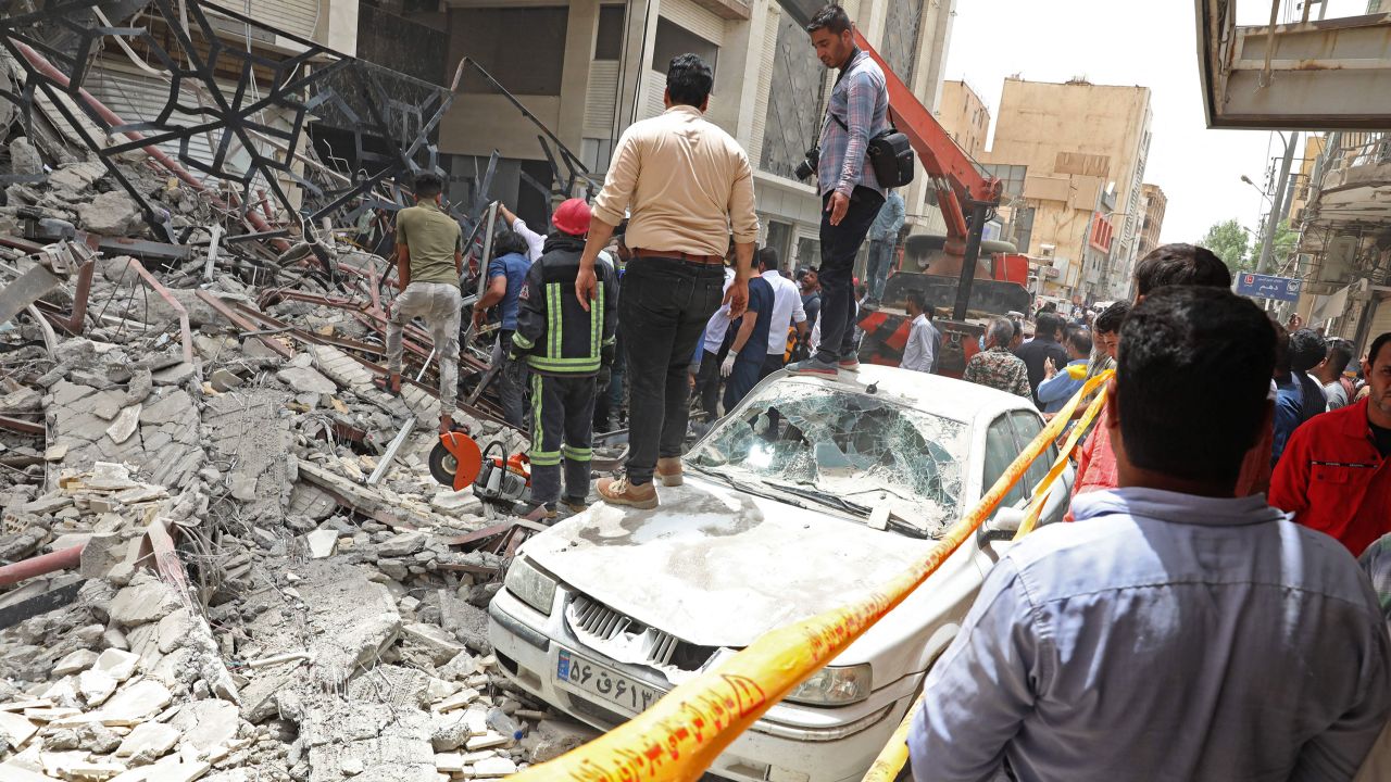 Iranians gather at the site of the incident.