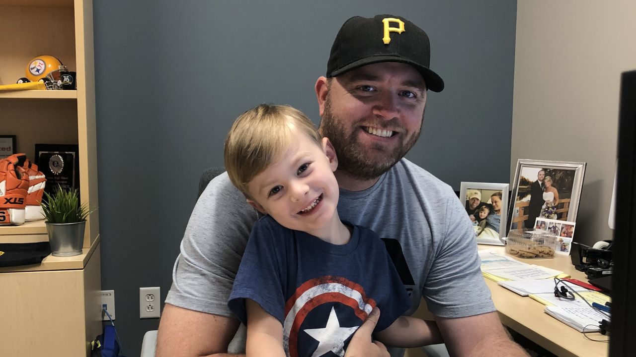 Soaring gas prices are forcing Mike Tobin (pictured here with his son) to shell out a lot more for his commute. 