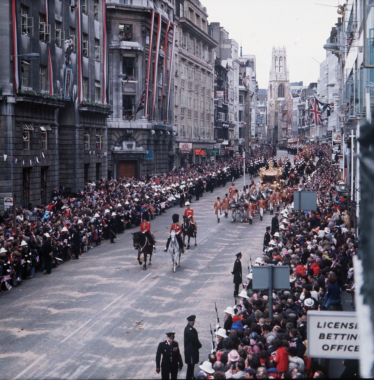 Huge crowds line the streets of London to see the royal procession during the Silver Jubilee celebrations on June 7, 1977.