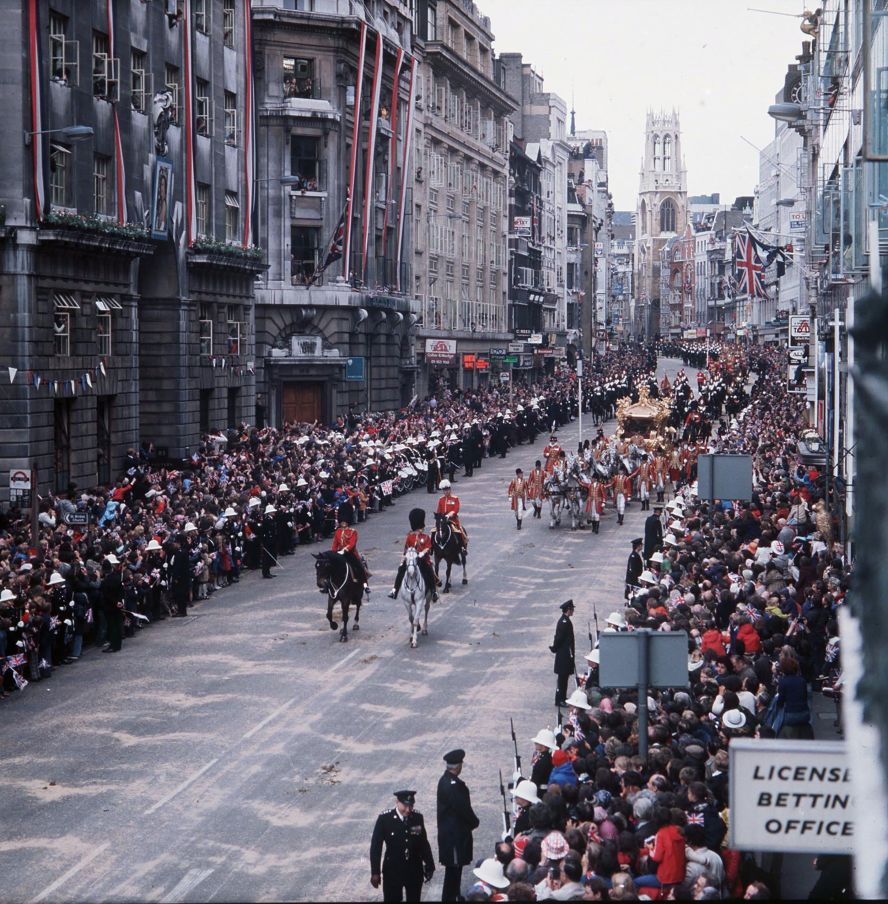 Huge crowds line the streets of London to see the royal procession during the Silver Jubilee celebrations on June 7, 1977.