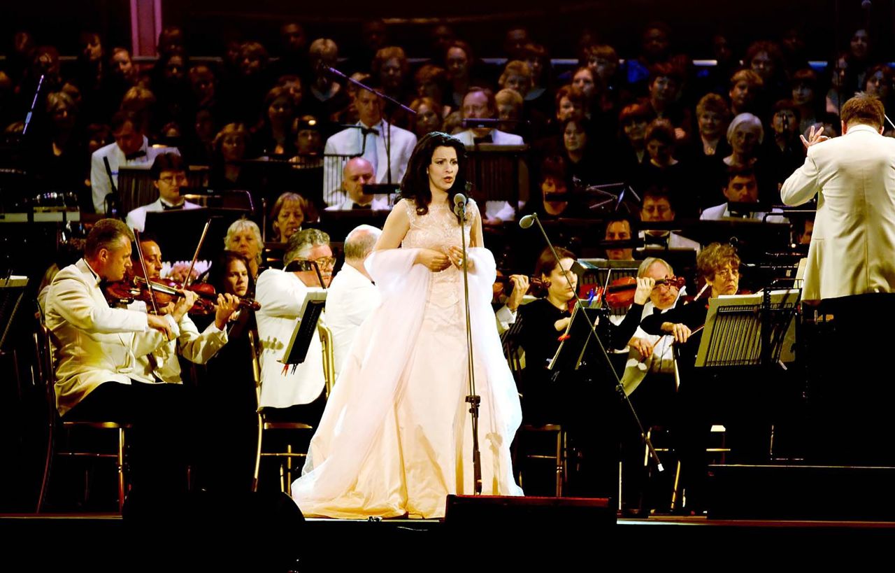 Romanian soprano Angela Gheorghiu performs on a stage at the Golden Jubilee concert. Twelve thousand tickets were allocated by ballot for the event, which also featured New Zealand soprano Kiri Te Kanawa.