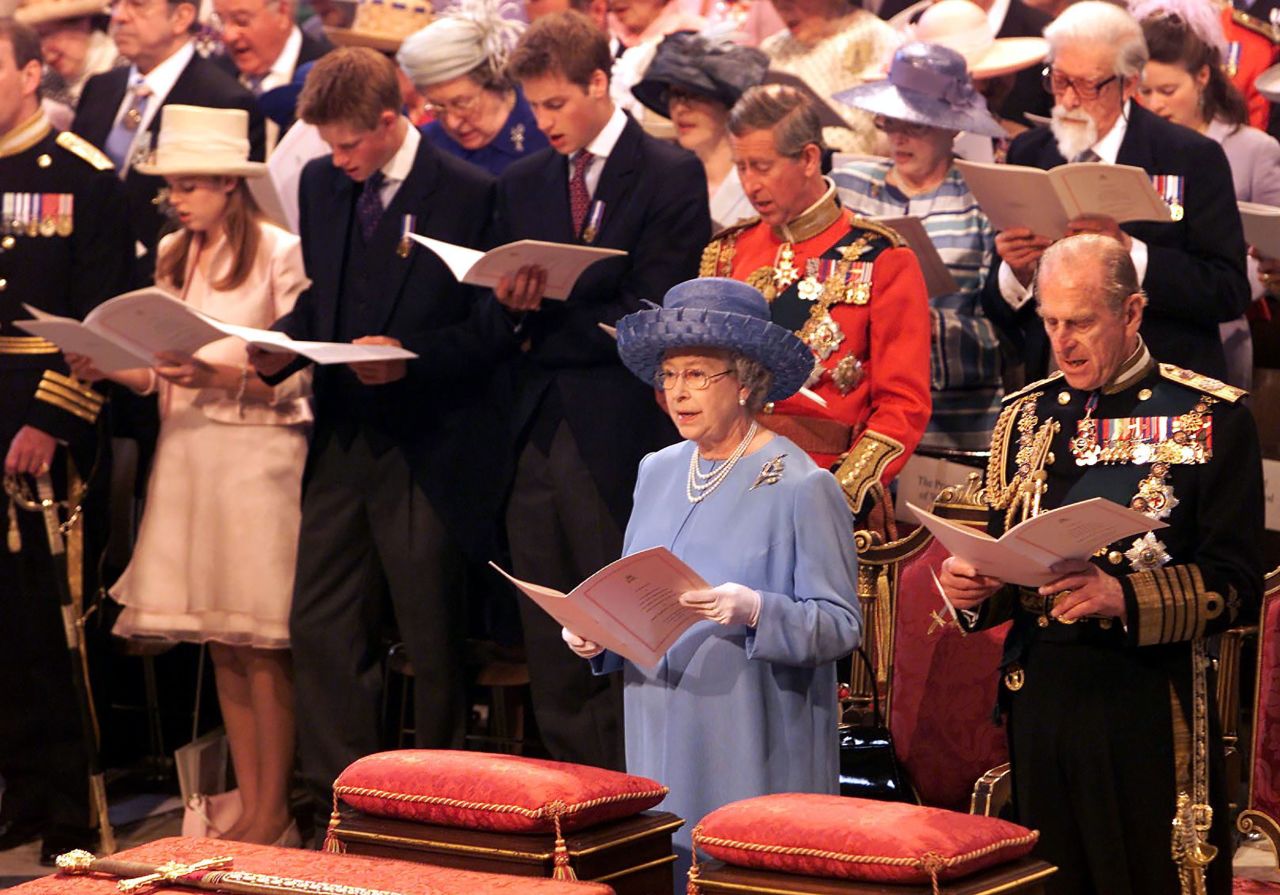 The Queen is joined by family members at the thanksgiving service, including (second row, left to right) Princess Beatrice, Prince Harry, Prince William and Prince Charles.