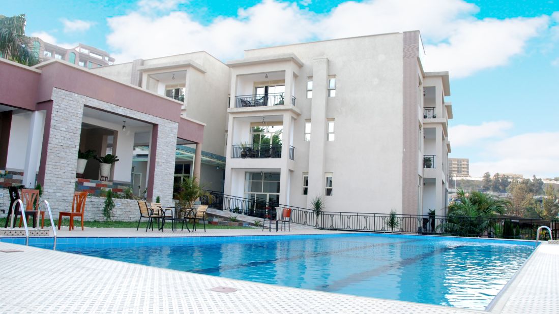 For less tech-savvy customers, the startup has partnered with independent travel agents who can book a property for them. This appeals to older customers, says founder Nghombombong Minuifuong. Pictured here are the Grazia apartments in Kigali, Rwanda, where guests can enjoy an outdoor swimming pool.