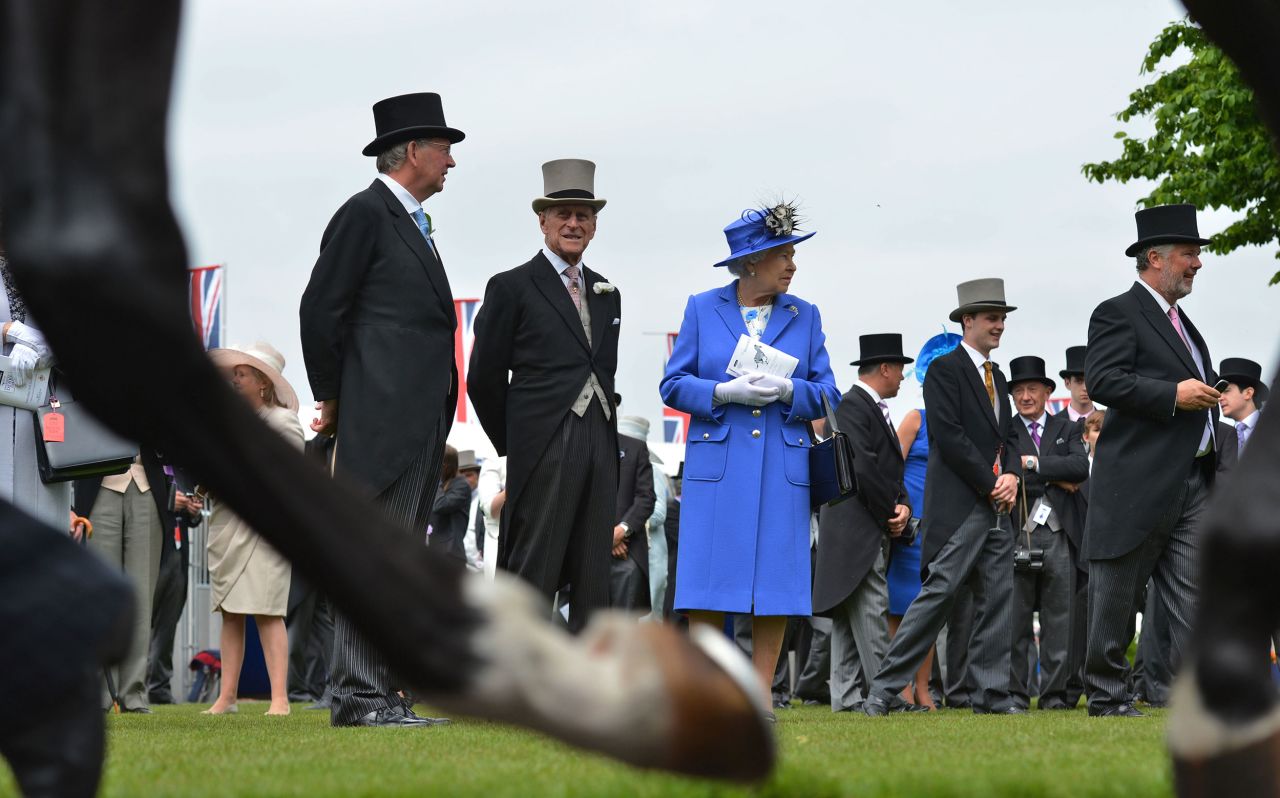The Diamond Jubilee weekend -- marking the 60th anniversary of the Queen's accession to the throne -- opens with a trip to the races. A lifelong horse lover, the Queen was joined by Prince Philip at Epsom Derby in Epsom, southern England, on Saturday, June 2, 2012, where they viewed the horses from the parade ring.