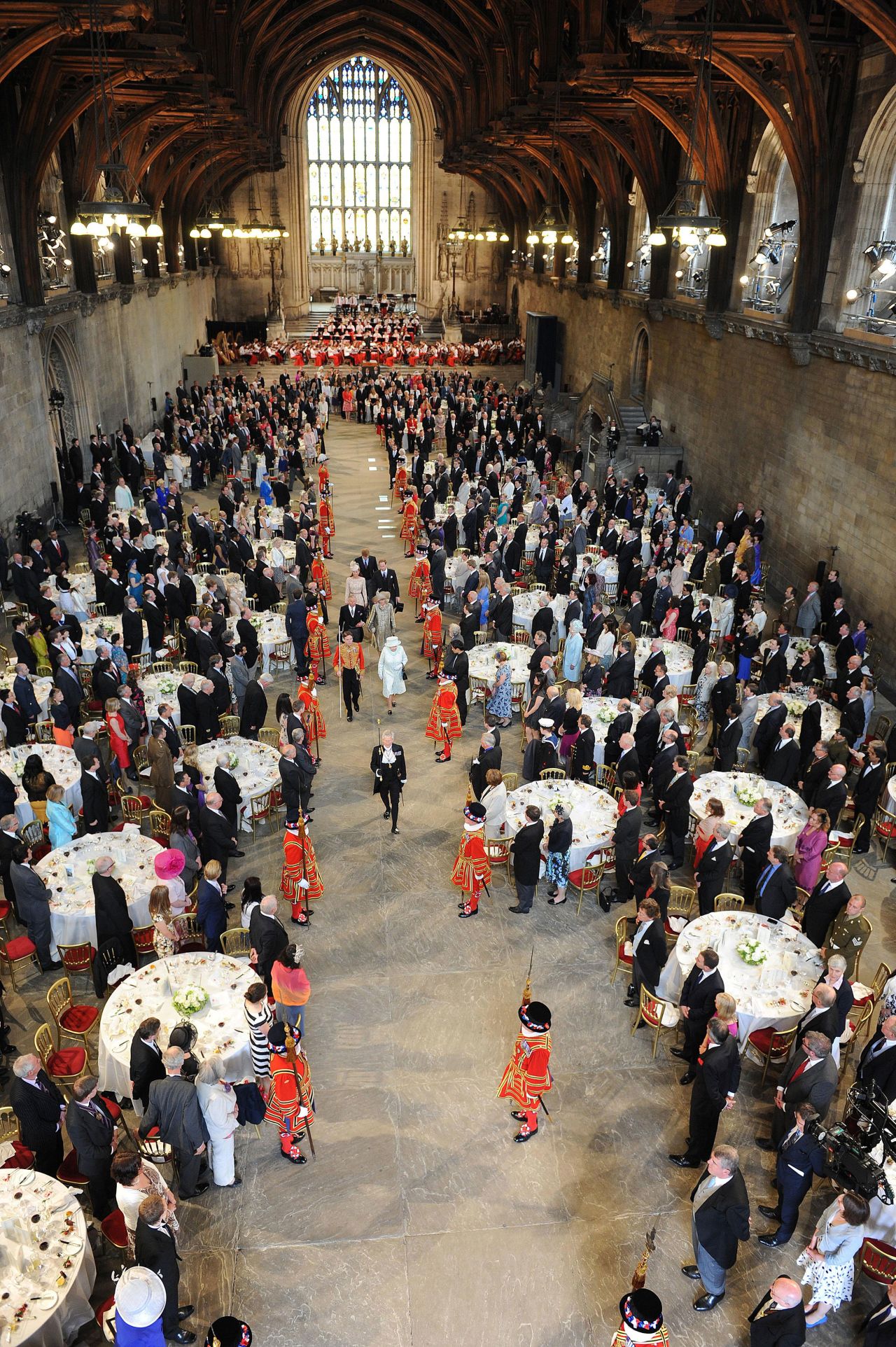 The Queen, the Prince of Wales, the Duchess of Cornwall, the Duchess and Duke of Cambridge and Prince Harry, leave Westminster Hall following the Diamond Jubilee Lunch in 2012.