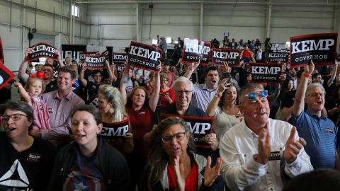 People attend a rally in Kennesaw for Georgia Gov. Brian Kemp ahead of the Republican primary.