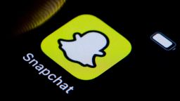 BERLIN, GERMANY - MARCH 10: In this photo illustration the logo of Snapchat can be seen on a smartphone on March 10, 2022 in Berlin, Germany. (Photo Illustration by Thomas Trutschel/Photothek via Getty Images)