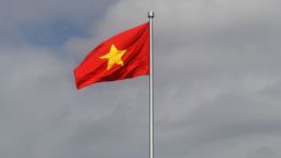 This photograph taken on August 28, 2019 shows a Vietnamese national flag on its mast flown at the Ho Chih Minh mausoleum in Hanoi. - The task of safeguarding the embalmed corpse of Vietnam's revolutionary leader Ho Chi Minh is gruelling: carefully-selected riflemen work around the clock, watching over the communist nation's founding father who died 50 years ago on September 2, 1969. (Photo by Manan VATSYAYANA / AFP) (Photo by MANAN VATSYAYANA/AFP via Getty Images)
