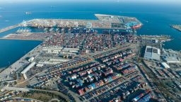 An aerial view of shipping containers sitting stacked at the Port of Los Angeles on April 15, 2022 in San Pedro, California.