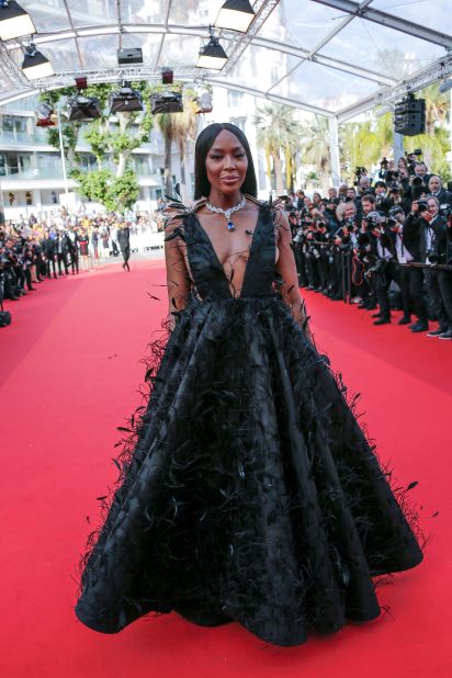 On the red carpet for "Decision To Leave (Heojil Kyolshim)," Naomi Campbell stole the show in a Valentino haute couture frock covered in feathers.