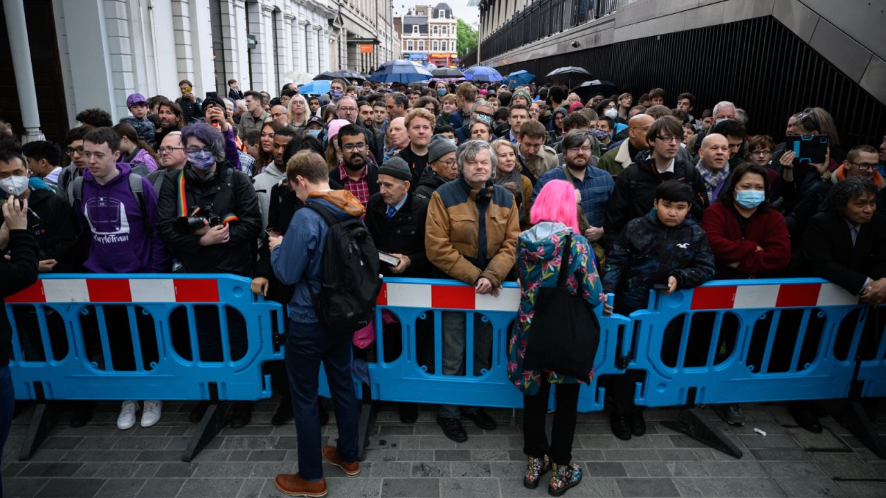 Crowds lined up outside Paddington Station to ride the first trains on London's new Elizabeth line.