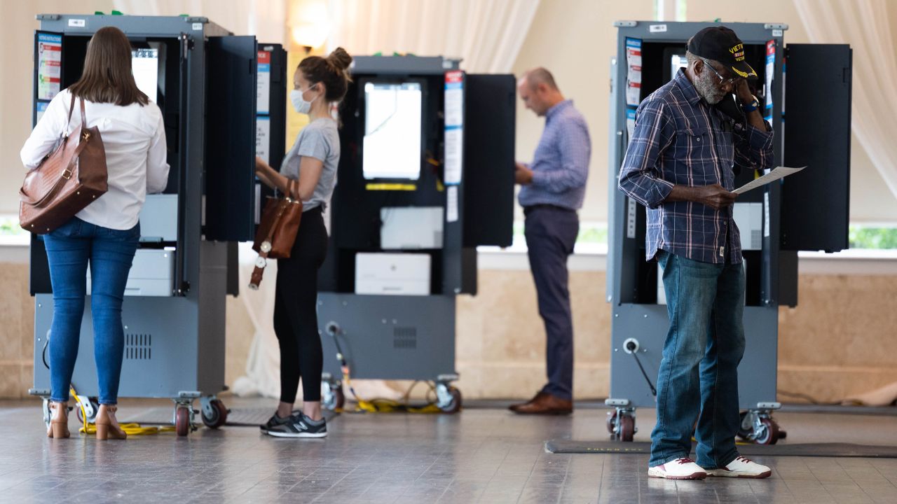 ATLANTA, GA - MAY 24: During the Georgia primary election, a voter checks his printed ballot at the Park Tavern polling location on May 24, 2022 in Atlanta, Georgia. Voters across Georgia will be voting on several positions, including U.S. Senate seats, Georgia Secretary of State, and the Governor position.  (Photo by Jessica McGowan/Getty Images)