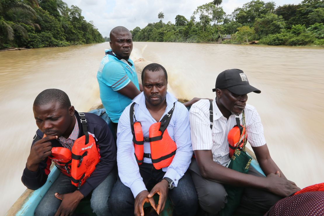 Chima Williams (center) and colleagues visit an oil-polluted area in Ikebiri Southern Ijaw, an area of the Niger Delta (Photo: George Osodi)