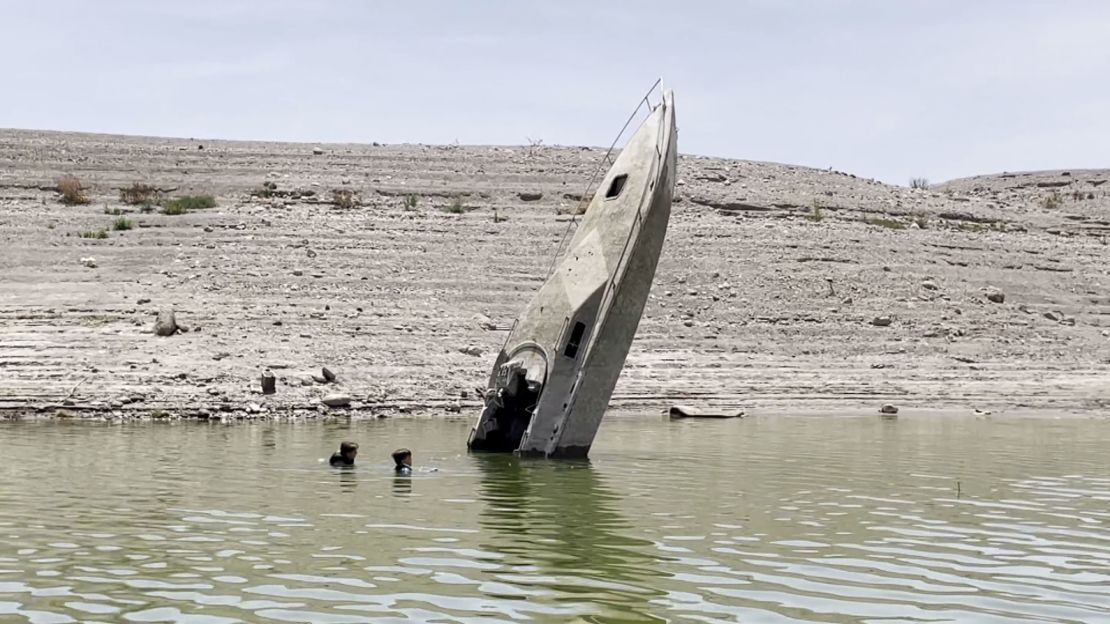 Formerly sunk boats are resurfacing at Lake Mead as the water level drops. 