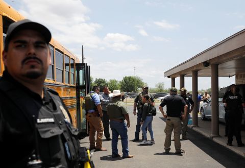 A child gets on a school bus Tuesday under the watch of law enforcement. Robb Elementary teaches second through fourth grades and had 535 students in the 2020-21 school year, according to state data. About 90% of students are Hispanic and about 81% are economically disadvantaged, the data shows. Thursday was set to be the last day of school before the summer break.