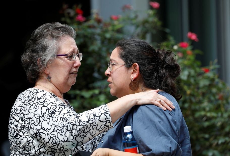 People react outside the civic center in Uvalde. This marks at least the 30th shooting at a K-12 school in 2022.