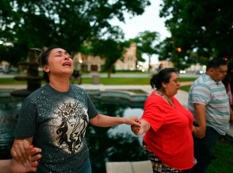 Kladys Castellón prays during a vigil that was held in Uvalde on May 24.