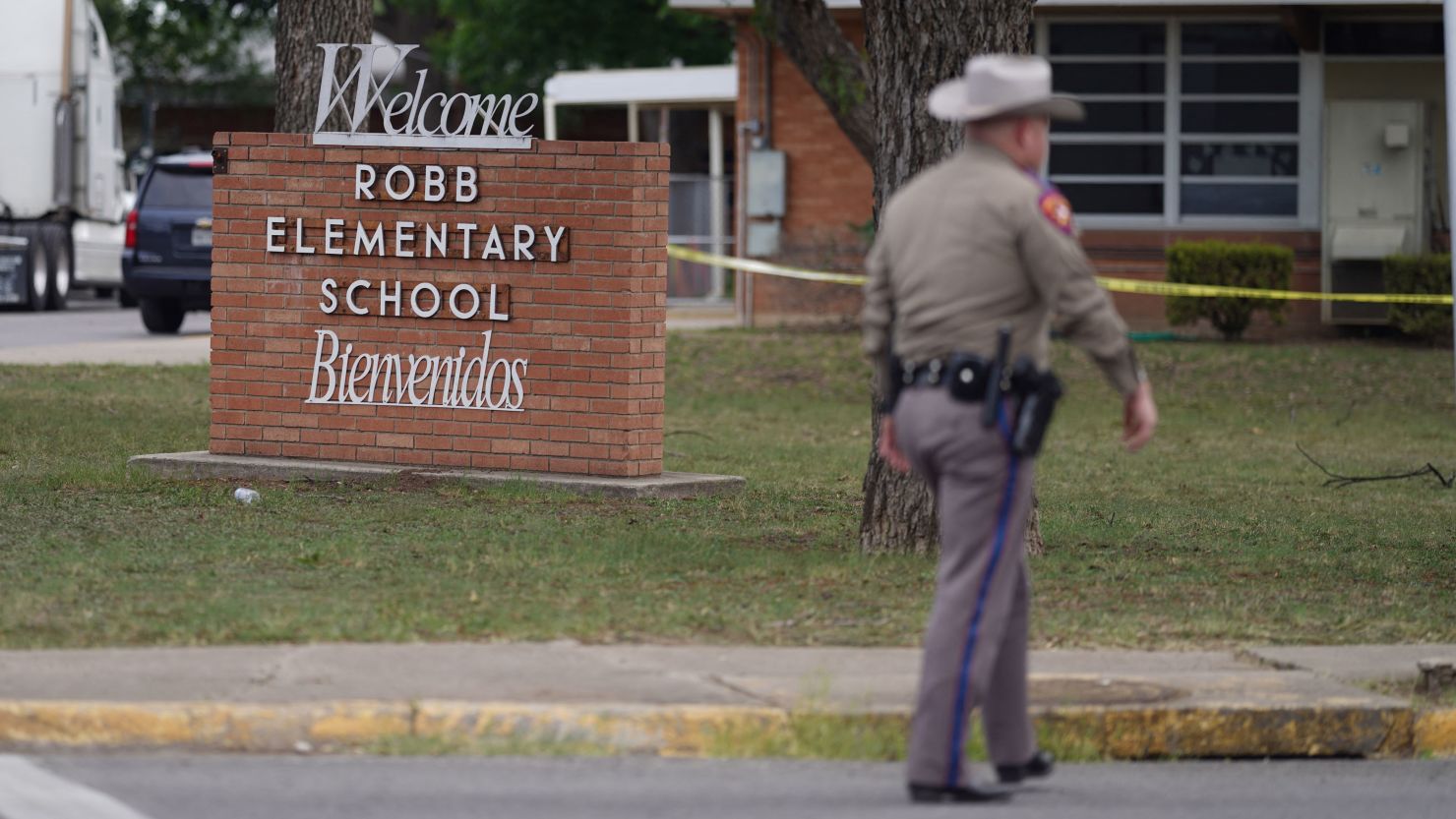 An officer walks outside of Robb Elementary School in Uvalde, Texas, on May 24.