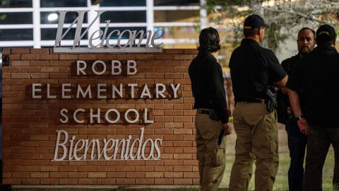 Law enforcement officers outside of Robb Elementary School following the mass shooting on Tuesday.