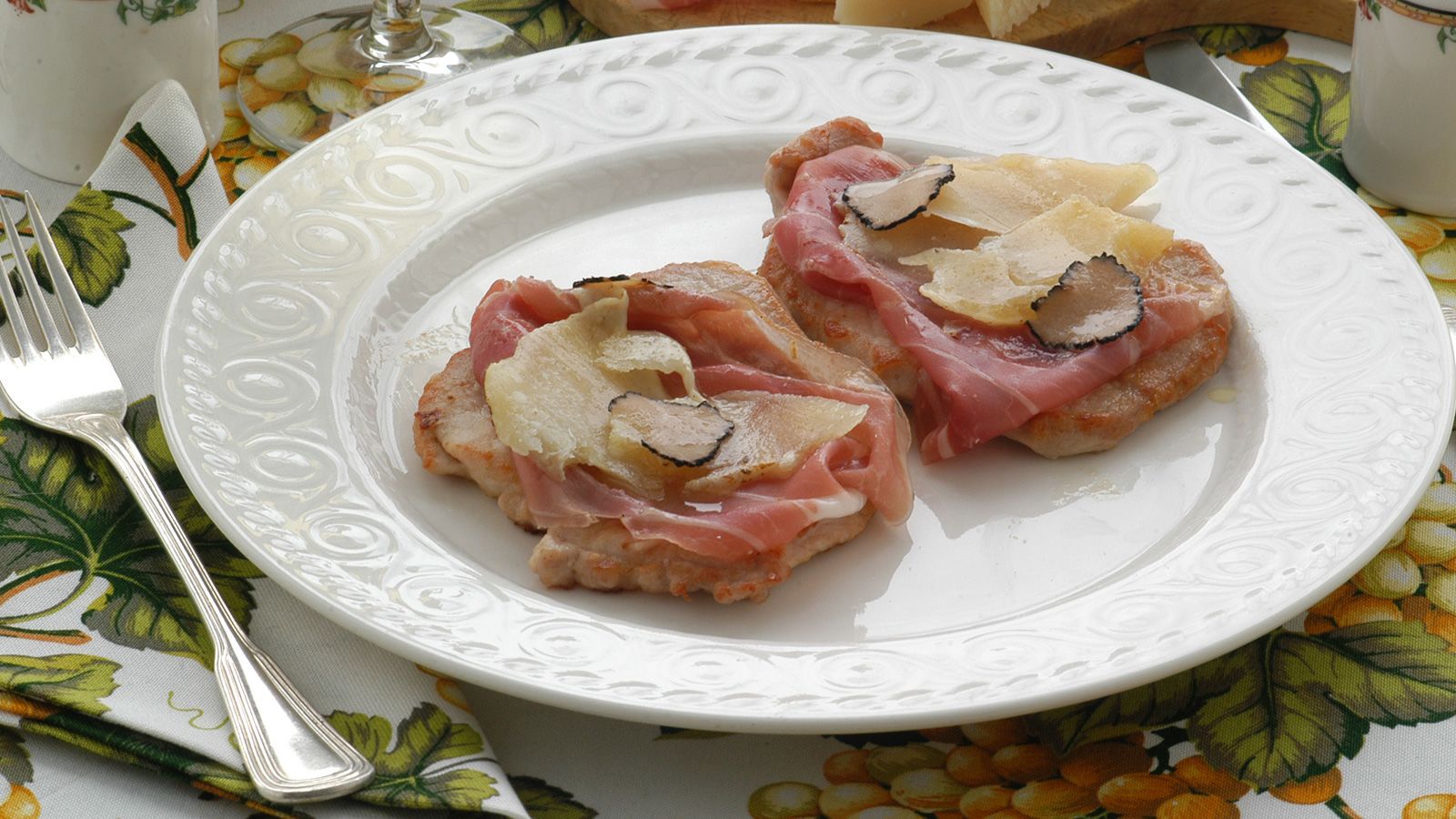 <strong>Naughty but nice:</strong> Bologna's cotoletta alla bolognese layers prosciutto and cheese on a veal cutlet.