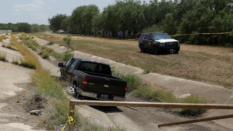 A truck authorities believe belonged to the Robb Elementary School shooter sits crashed in a ditch.
