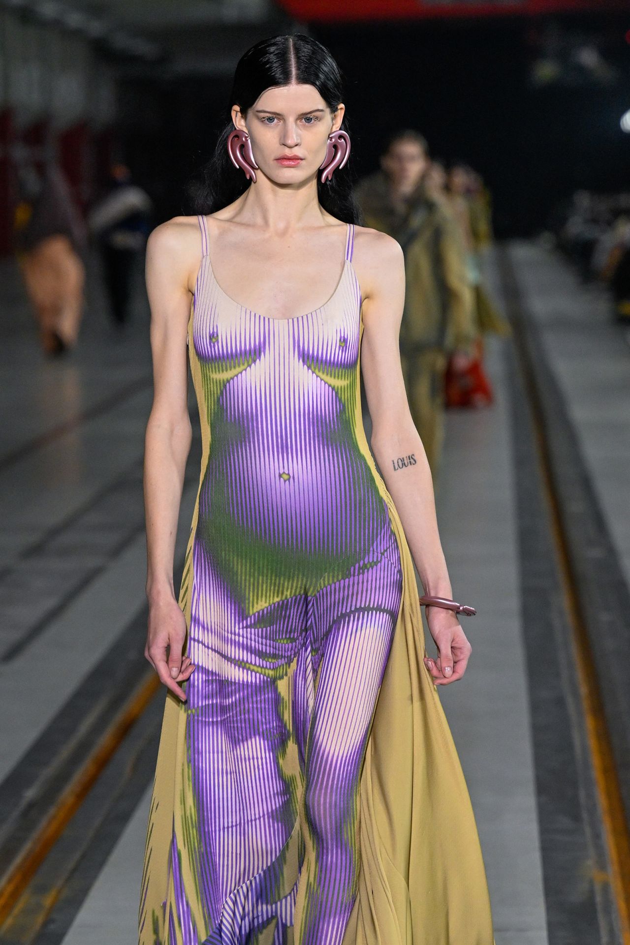 A model walks the runway during the Y/Project Menswear Fall/Winter 2022-2023 show as part of Paris Fashion Week 2022.