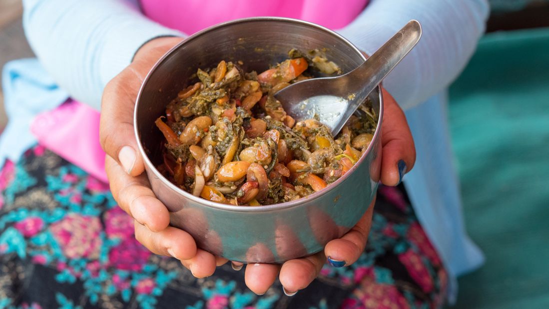 <strong>Lahpet thoke, Myanmar: </strong>This delicious tea leaf salad has an earthy, sour and slightly bitter taste, owing to the star ingredient: fermented or pickled Assam tea leaves. The leaves are mixed with cabbage, tomatoes, beans, roasted nuts, toasted seeds, dried shrimp and fried garlic. 