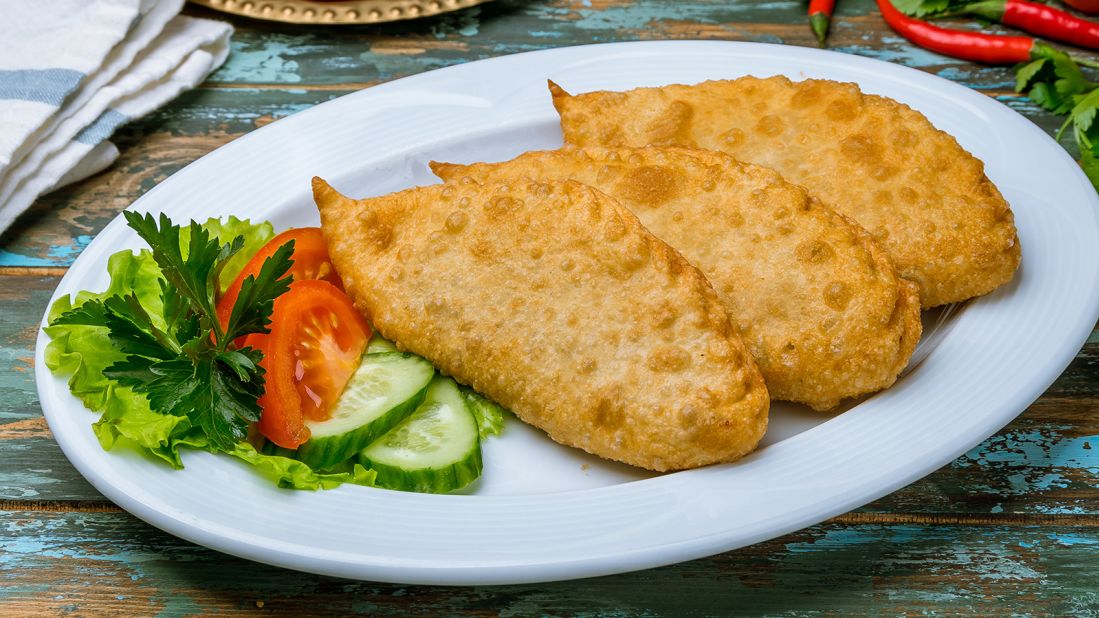 <strong>Khuushuur, Mongolia: </strong>Mongolia's beloved street snack, khuushuur is both hearty and filling. A large, deep-fried meat pastry, it's usually filled with minced mutton or beef, plus onion and garlic.