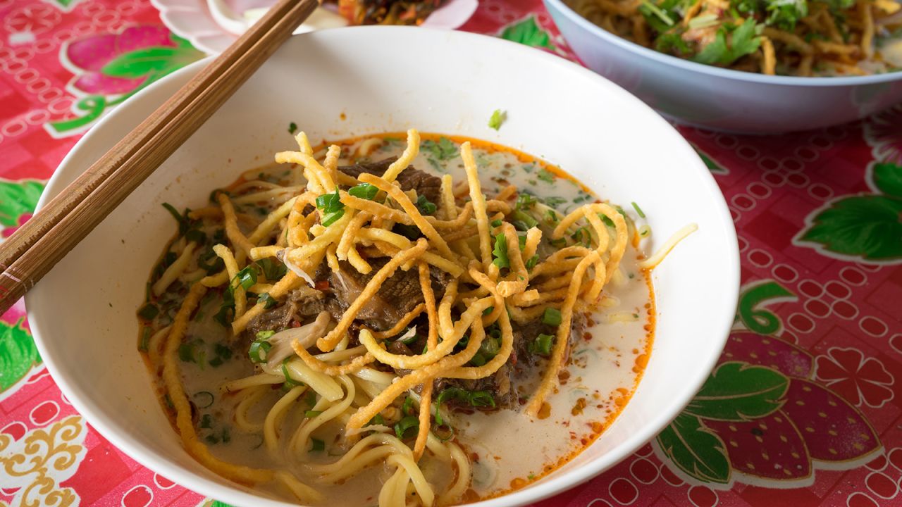 <strong>Khao soi, Thailand: </strong>A staple in Northern Thailand, khao soi -- curry noodle soup topped with deep-fried egg noodles -- hits the spot.<br />Vendors ladle gorgeously golden bowls of hearty, creamy, chili-laced coconut broth over a bed of egg noodles with chicken legs or beef. Still hungry? Check out our <a href="http://www.cnn.com/travel/article/asia-best-street-foods-cmd/index.html" target="_blank">full list of 50 of Asia's best street foods.  </a>