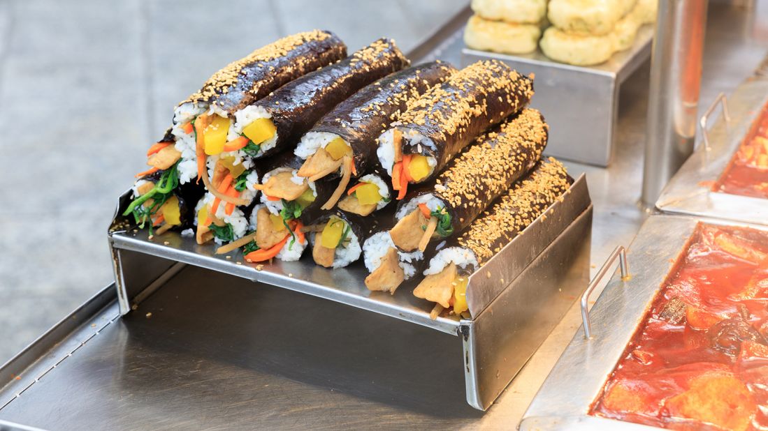 <strong>Kimbap, South Korea: </strong>These rice rolls wrapped in seaweed sheets are cut into easy-to-devour slices. Hawkers fill them with a wide assortment of ingredients including spinach, lotus root, eggs, cucumbers, bulgogi, crab sticks, pickled daikon radish, kimchi and roasted sesame seeds.