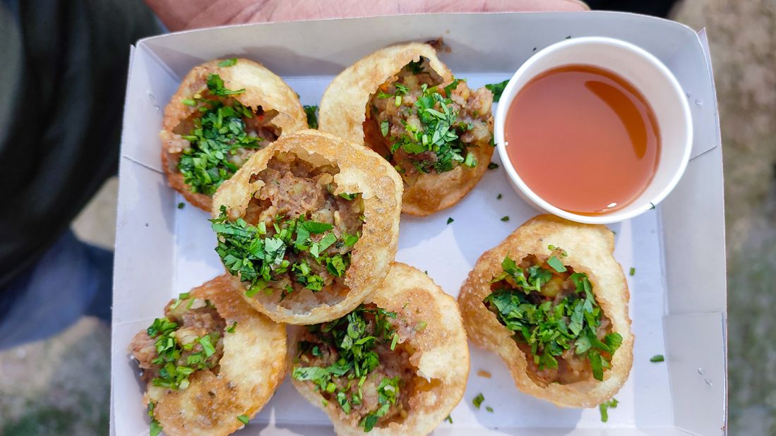 <strong>Fuchka, Bangladesh: </strong>Fuchka is one of the most ubiquitous street foods in Bangladesh. The crispy, hollow spheres commonly come with a filling of mashed potatoes and chickpeas, mixed with freshly chopped onions, cucumber, lime, coriander and green chillies in a chaat masala blend. 