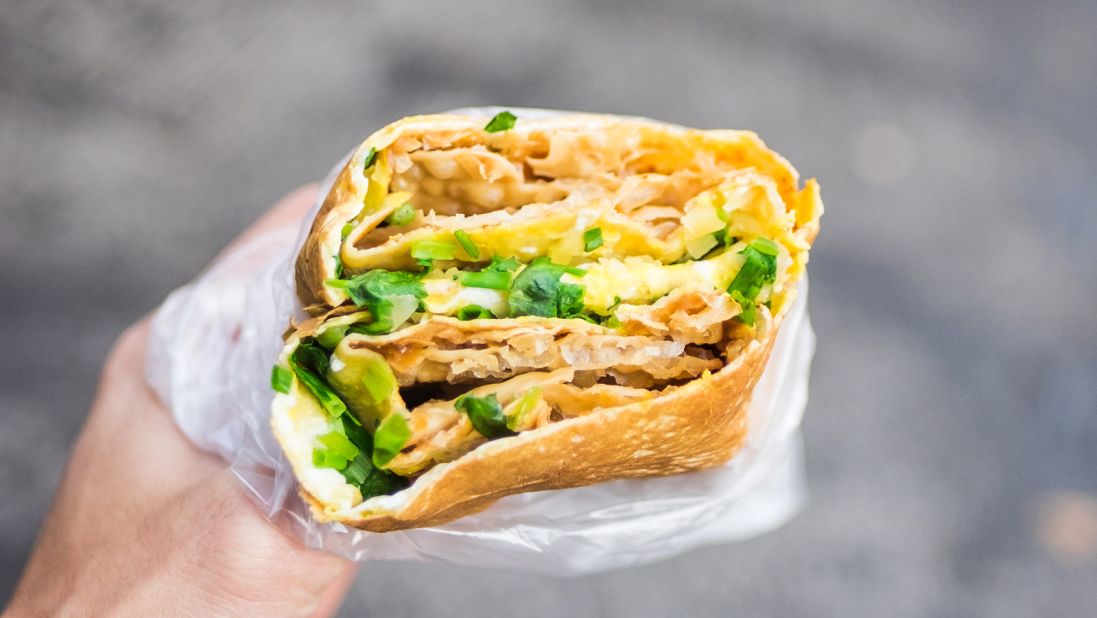 <strong>Jianbing, China: </strong>Perfect for on-the-go snacking, vendors fry the pancake then fill it with a variety of savory flavors -- think eggs, spring onions, radishes, chili sauce and sausage or chicken.