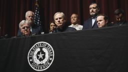 Greg Abbott, governor of Texas, center, during a news conference in Uvalde, Texas, US, on Wednesday, May 25, 2022. President Joe Biden mourned the killing of at least 19 children and two teachers in a mass shooting at a Texas elementary school on Tuesday, decrying their deaths as senseless and demanding action to try to curb the violence. Photographer: Eric Thayer/Bloomberg via Getty Images