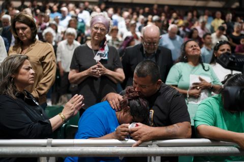 People react during a prayer vigil in Uvalde on Wednesday.