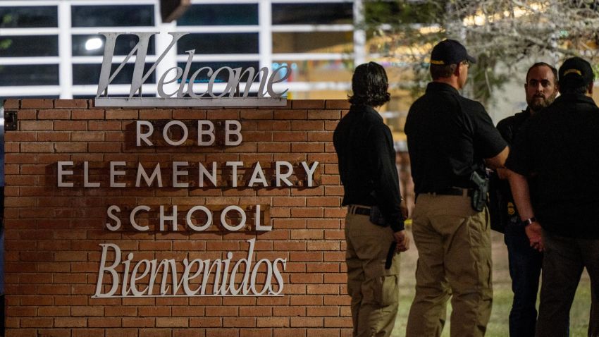 UVALDE, TEXAS - MAY 24: Law enforcement officers speak together outside of Robb Elementary School following the mass shooting at Robb Elementary School on May 24, 2022 in Uvalde, Texas. According to reports, 19 students and 2 adults were killed, with the gunman fatally shot by law enforcement. (Photo by Brandon Bell/Getty Images)
