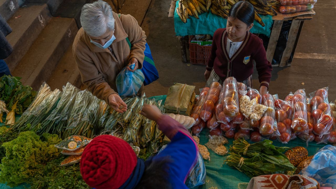 A shopper buys produce at the Silvia Market in Cauca, Colombia, this month. Colombian inflation accelerated to its fastest pace since July 2000 in April.