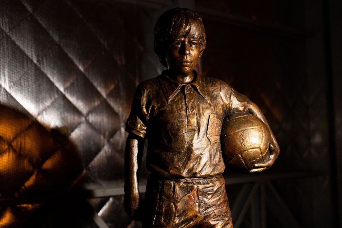 A sculpture representing Argentine late football star Diego Armando Maradona as a child is seen during the presentation of the aircraft.