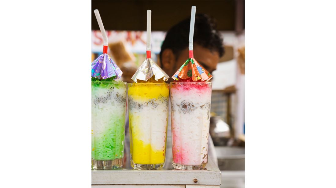 <strong>Falooda, Pakistan: </strong>Akin to an ice cream sundae, this milk-based drink is comprised of ice cream or kulfa (a dense, gelato-like ice cream), milk, condensed milk, jelly cubes, noodles, basil seeds and sometimes rose water syrup to achieve a bright, rosy pink hue. A crown of crushed pistachios and dried fruit add more texture. 