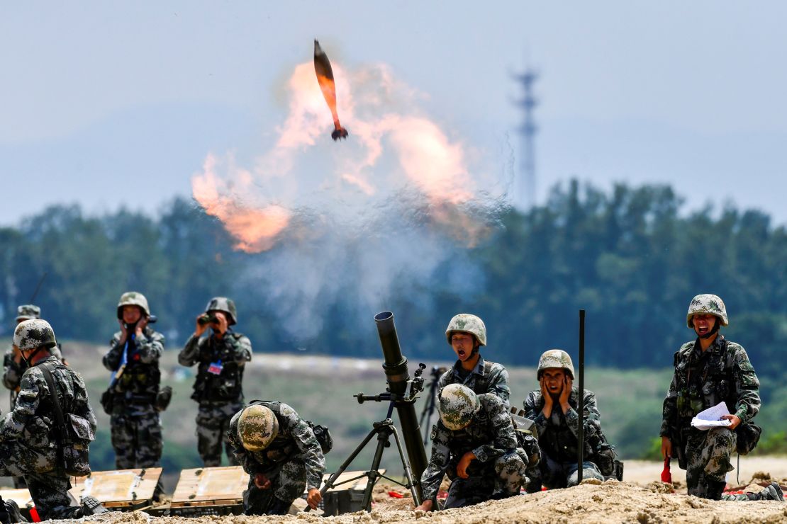 Soldiers of Chinese People's Liberation Army (PLA) fire a mortar during a live-fire military exercise in Anhui province, China May 22, 2021. 