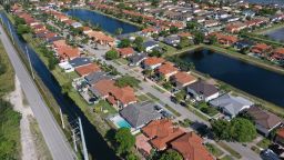 In an aerial view, single family homes are shown in a residential neighborhood on May 10, 2022 in Miami, Florida. 