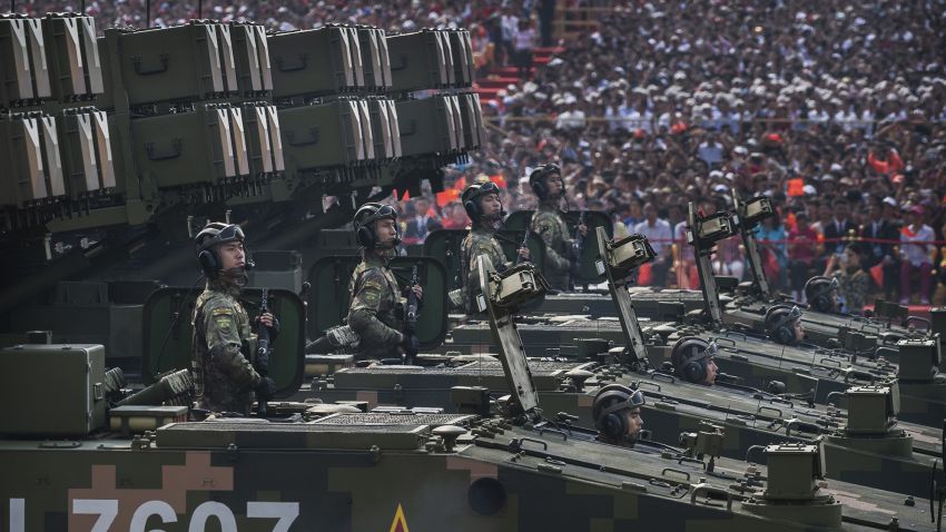 BEIJING, CHINA - OCTOBER 01: Chinese soldiers sit atop mobile rocket launchers as they drive in a parade to celebrate the 70th Anniversary of the founding of the People's Republic of China in 1949, at Tiananmen Square on October 1, 2019 in Beijing, China. (Photo by Kevin Frayer/Getty Images)