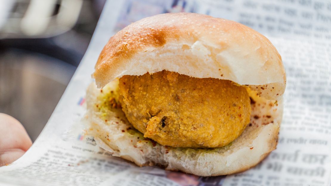 Vada pav: Deep-fried potatoes on a fluffy bun. 