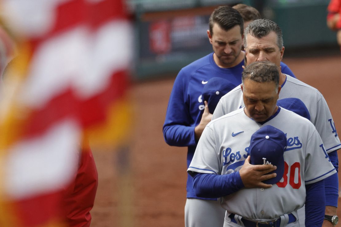 Roberts observes a moment of silence prior to the start of the Dodgers' game against the Washington Nationals.